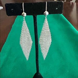 Tiffany sterling mesh earring by Elsa Peretti.